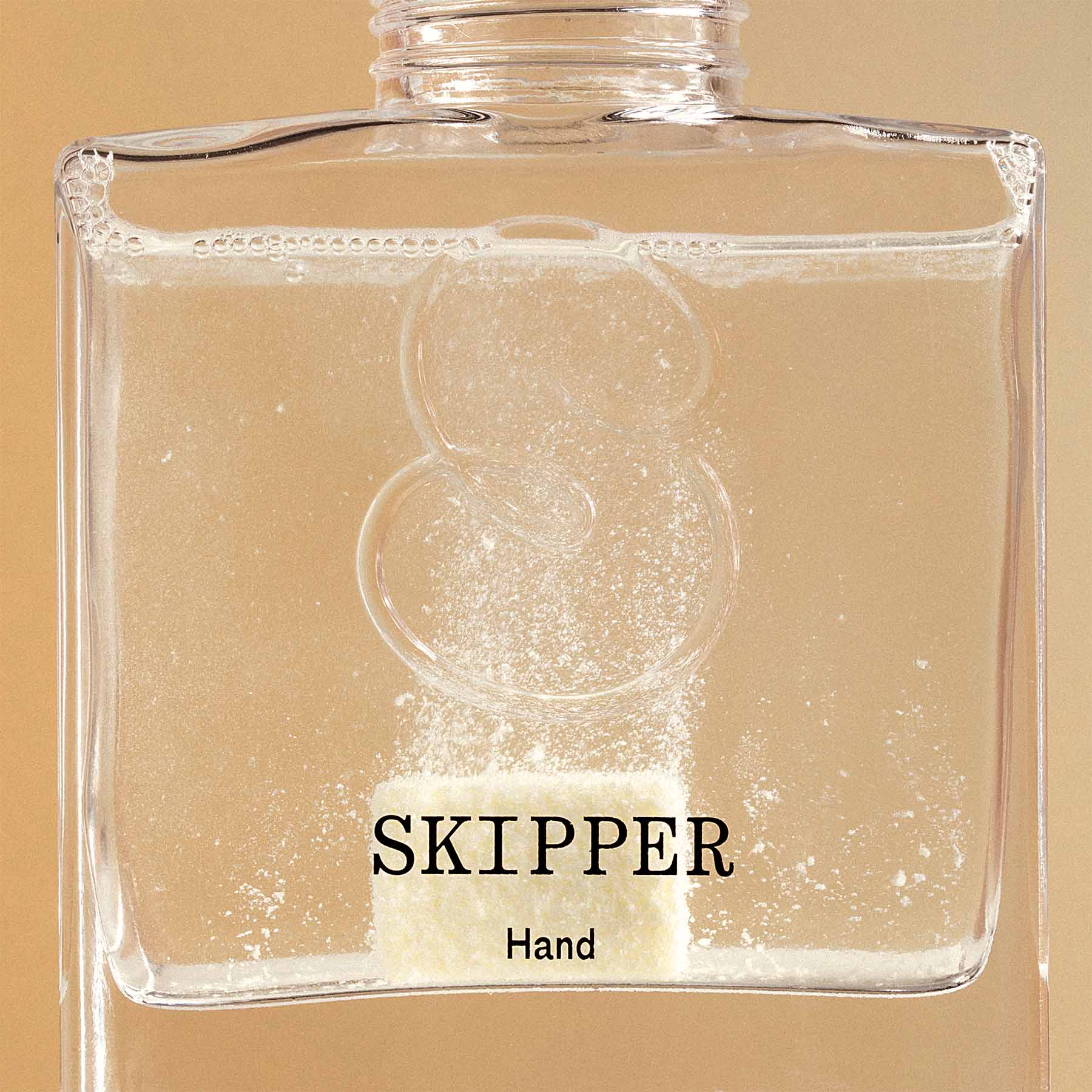 Tablet dissolving in a 250ml glass Skipper hand wash dispenser