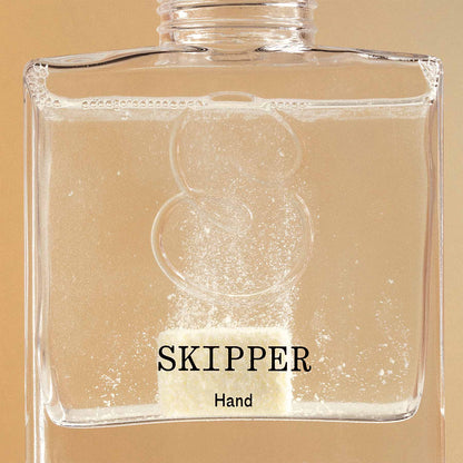 Tablet dissolving in a 250ml glass Skipper hand wash dispenser